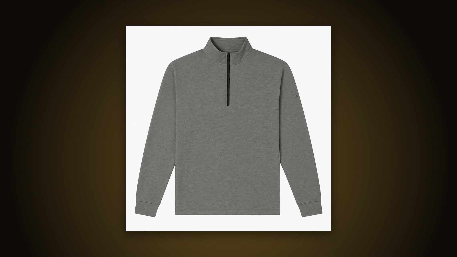 Black heather Adidas A401 golf quarter-zip blank on a dark gold-lit background
