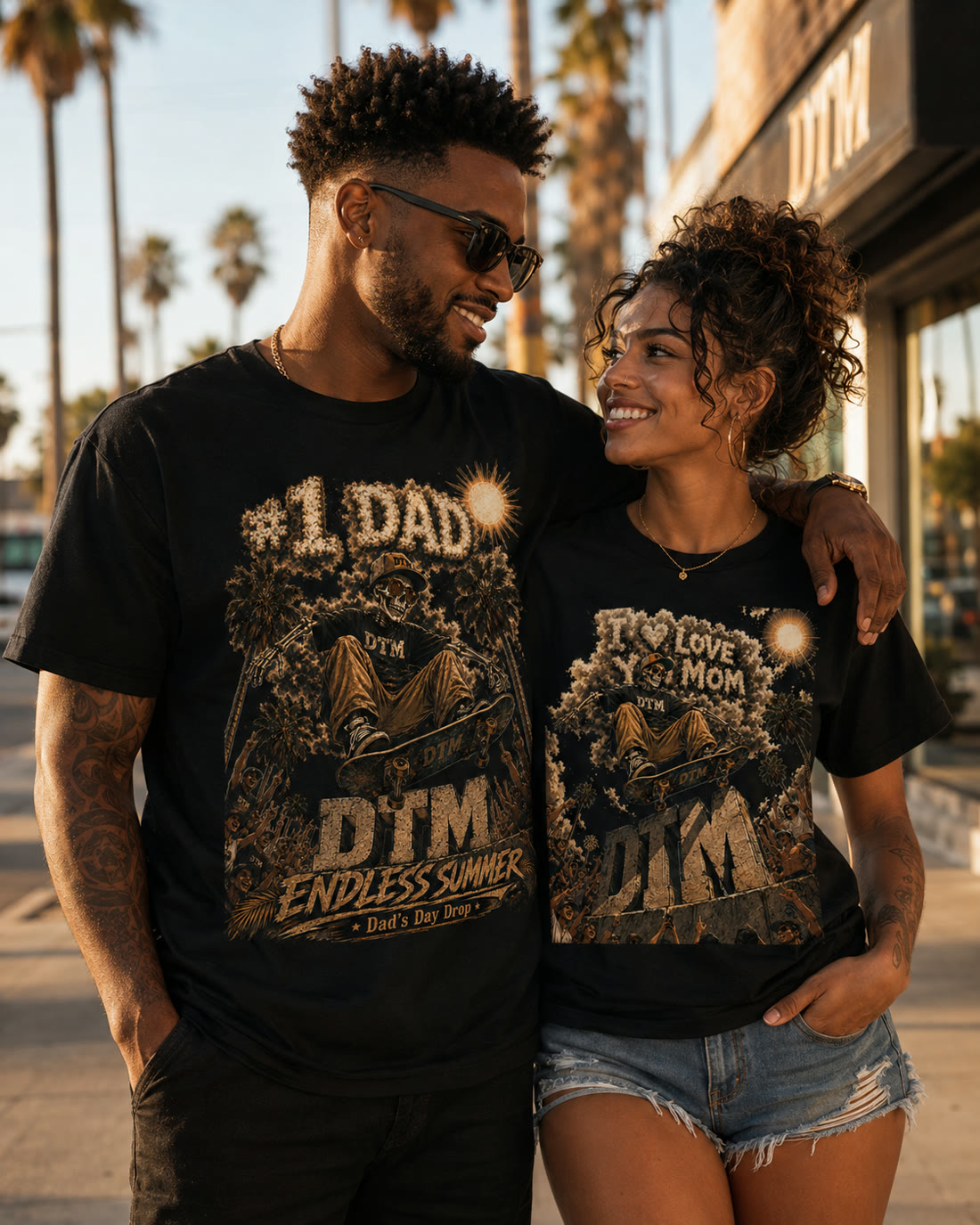 Man in the #1 Dad tee and woman in the I Love You Mom tee at golden hour